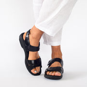 Model wearing Josef Seibel Debra Black sandals. Size 42 women's sandals