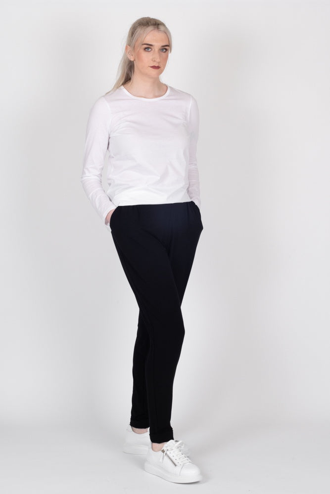 Tall model wearing Freida Pants Black, front