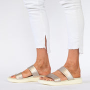 Model wearing Cassini Mellow Platinum slides for long feet. Womens size 43 sandals
