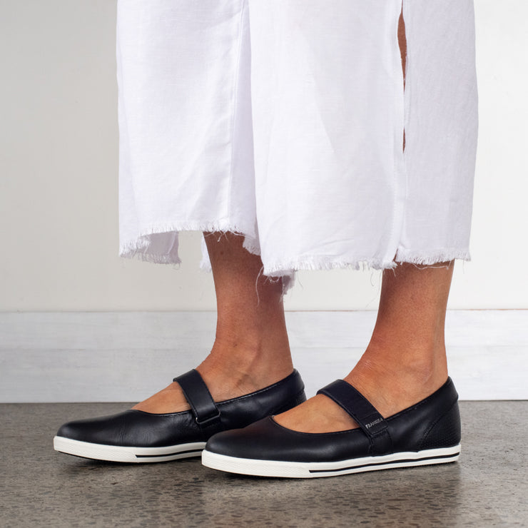 Model wearing Frankie4 Addi Black White leather shoes. Womens Size 13 shoes