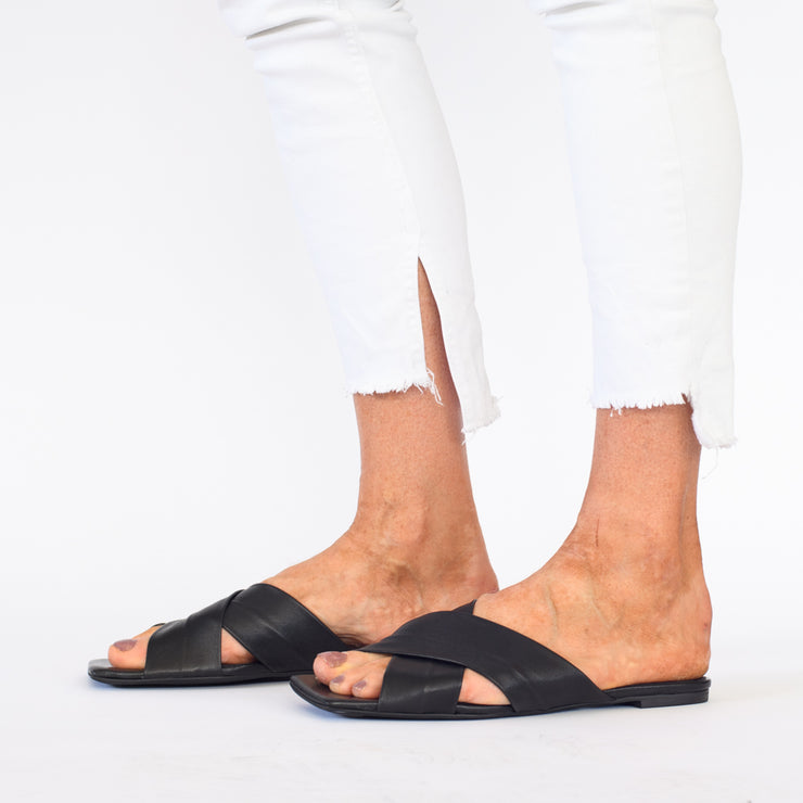 Model wearing Minx Megs Black slides for long feet. Womens Size 43 sandals