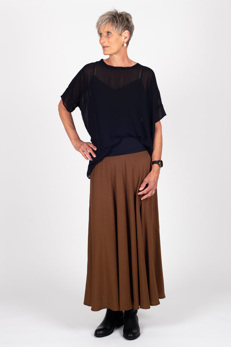 Tall model wearing Paris Skirt Cinnamon