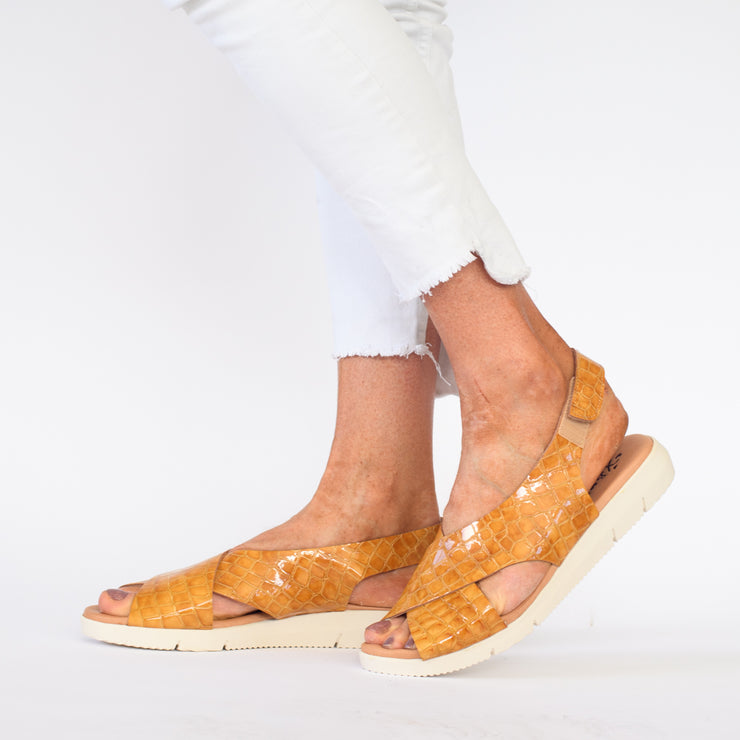 Model wearing Rosa Tan Patent sandals by XBonita for long feet
