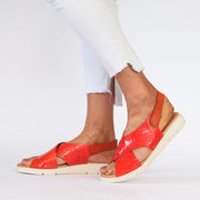 Model wearing Rosa Orange Patent Croc Print sandals by XBonita for long feet