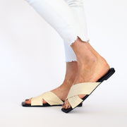 Model wearing Minx Megs Ivory slides. Womens Size 45 sandals
