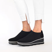 Model wearing Bresley Vulcan Black shoes. Size 44 womens shoes