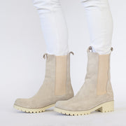 Model wearing Babouche Lifestyle Remy Beige Suede boots. Womens size 44 boots