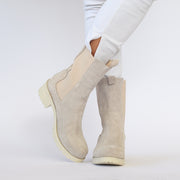 Model wearing Babouche Lifestyle Remy Beige Suede boots. Womens size 43 boots