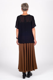 Tall model wearing Paris Skirt Cinnamon with top out