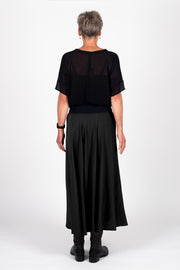 Model wearing Paris Skirt Black back with top in