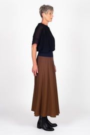 Tall model wearing Paris Skirt Cinnamon side right