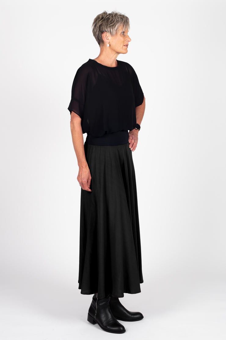 Model wearing Paris Skirt Black side