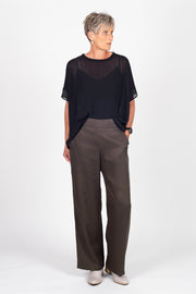 Tall model wearing Celine Pants Grey Check, front