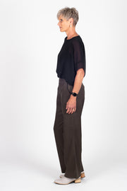 Tall model wearing Celine Pants Grey Check, side