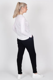 Tall model wearing Freida Pants Black, side 2