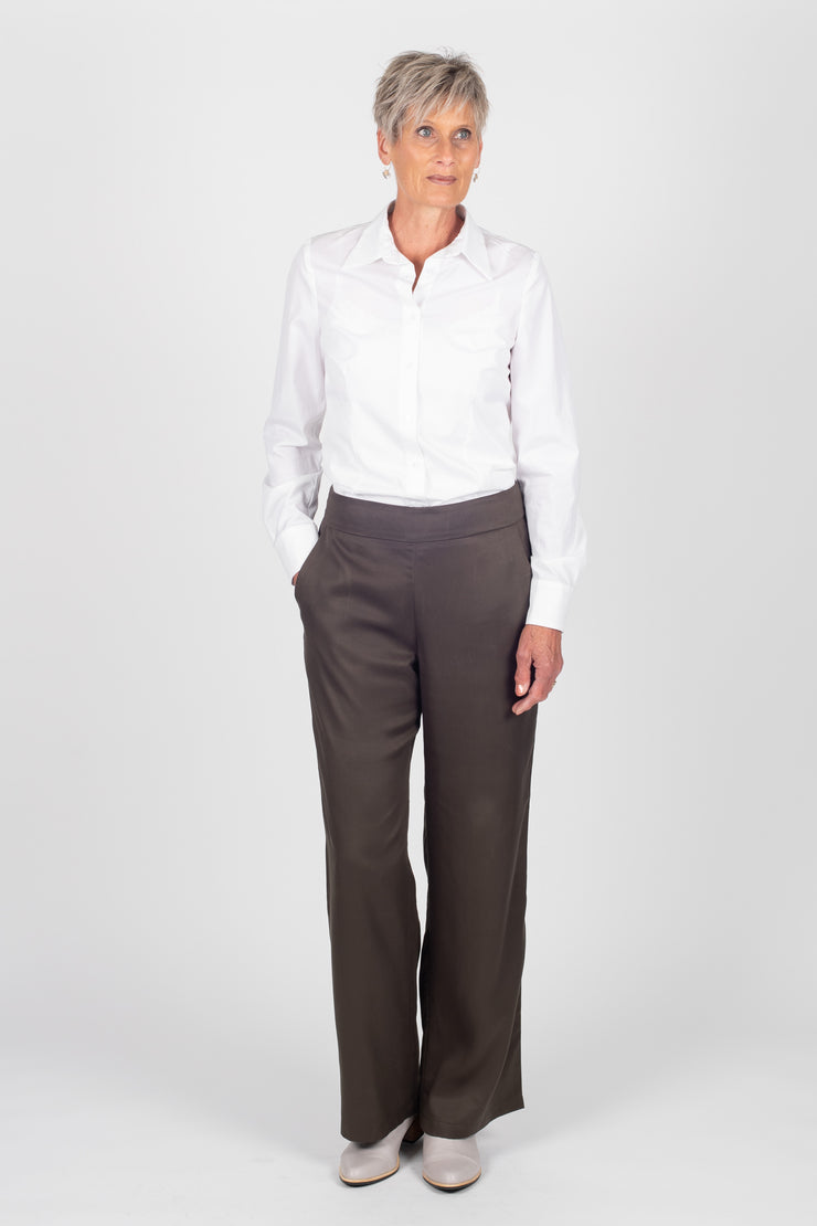 Tall model wearing Celine Pants Black