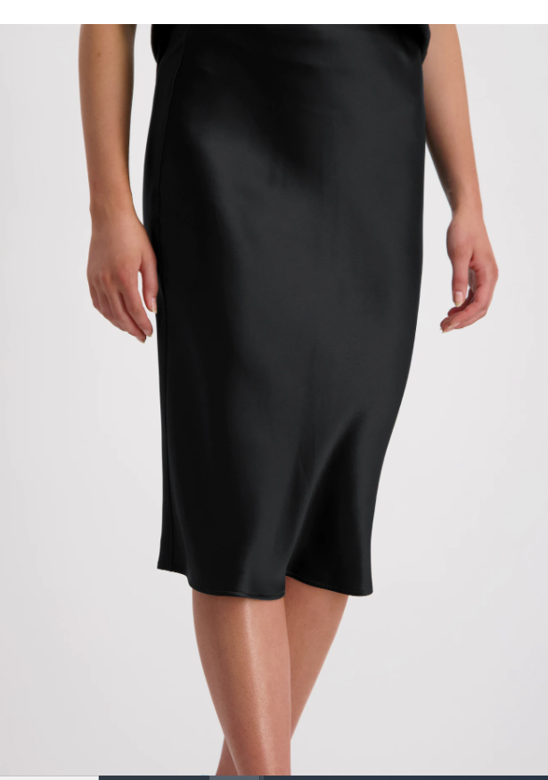 Model wearing Liquid Skirt Black Satin