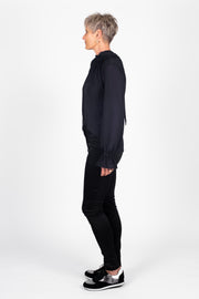 Tall model wearing Millie REVERSIBLE Top Black, side