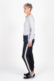 Tall model wearing Side Swipe Relax Pant Black Stripe, side