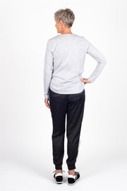Tall model wearing Side Swipe Relax Pant Black Stripe, back