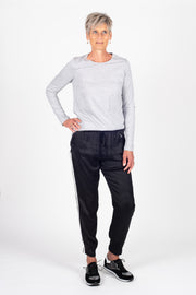 Tall model wearing Side Swipe Relax Pant Black Stripe