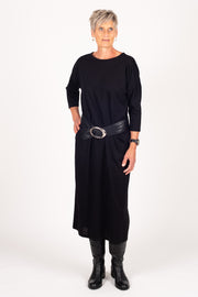 Tall model wearing Lulu Dress Black, front with belt