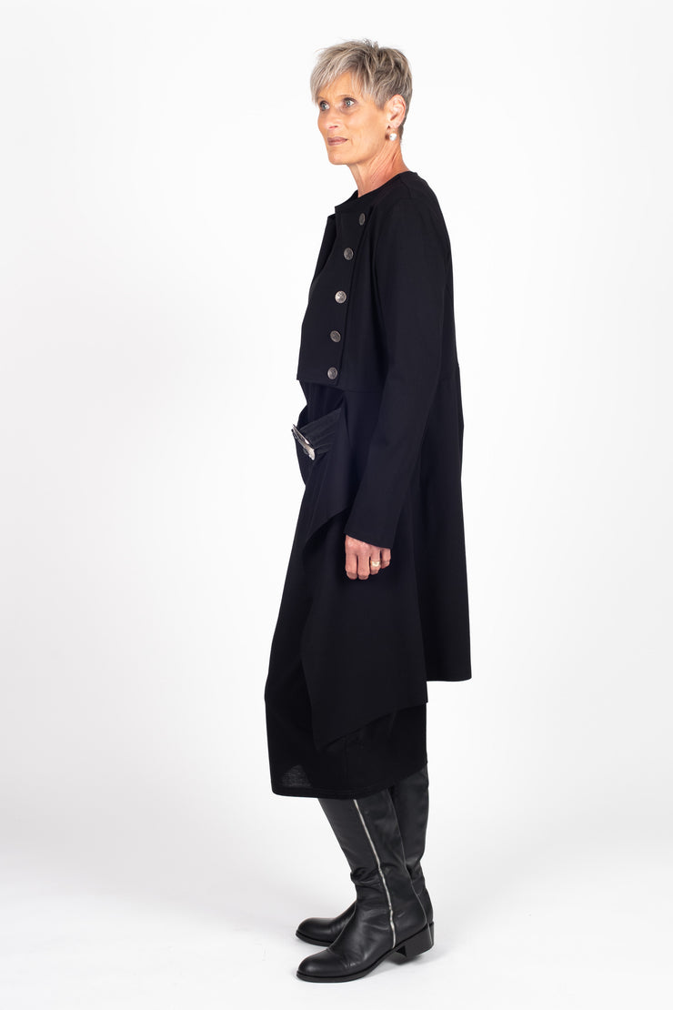 Tall model wearing X Lab Coat Black, side