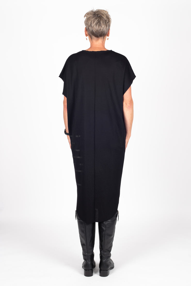 Tall model wearing Crossing The Lines Dress Black Black, back