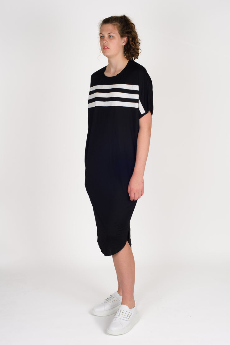 Side view of tall woman in Style X Lab Think Dress in Black. Made longer for tall women