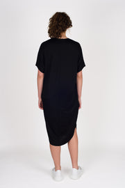 Back view of tall woman in Style X Lab Think Dress in Black. Made longer for tall women