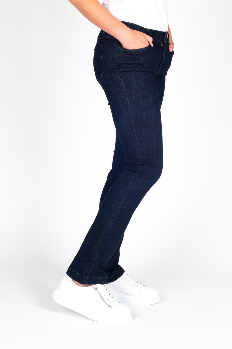 Tall model wearing Fallon Jeans Blue, side