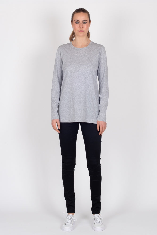 Tall model wearing Penny Tee Grey Marle, front untucked