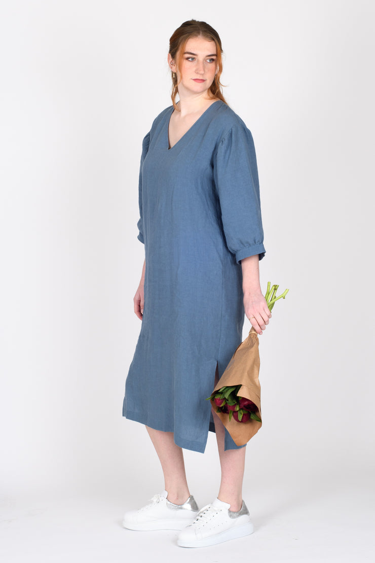 Tall model with flowers wearing Begin Dress Denim for tall women