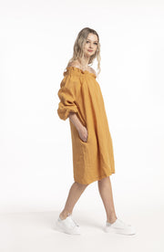 Model walking in Asymetric Sleeve Dress Masala for tall women