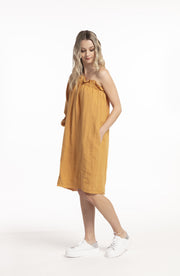 Model in Asymetric Sleeve Dress Masala for tall women