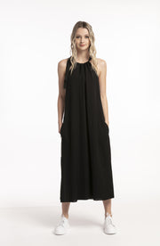 Model facing front wearing Potential Dress Black for tall women