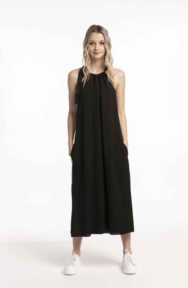 Model facing front wearing Potential Dress Black for tall women