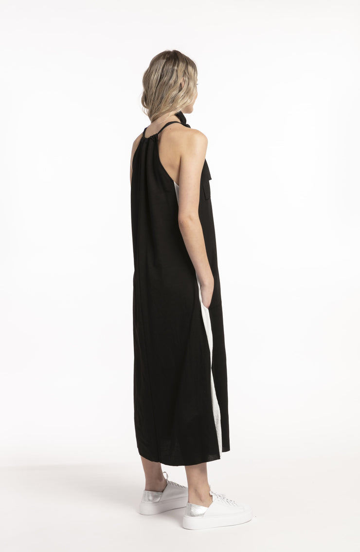 Back view of model wearing Potential Dress Black for tall women