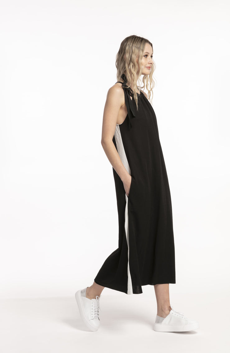 Model walking in Potential Dress Black for tall women