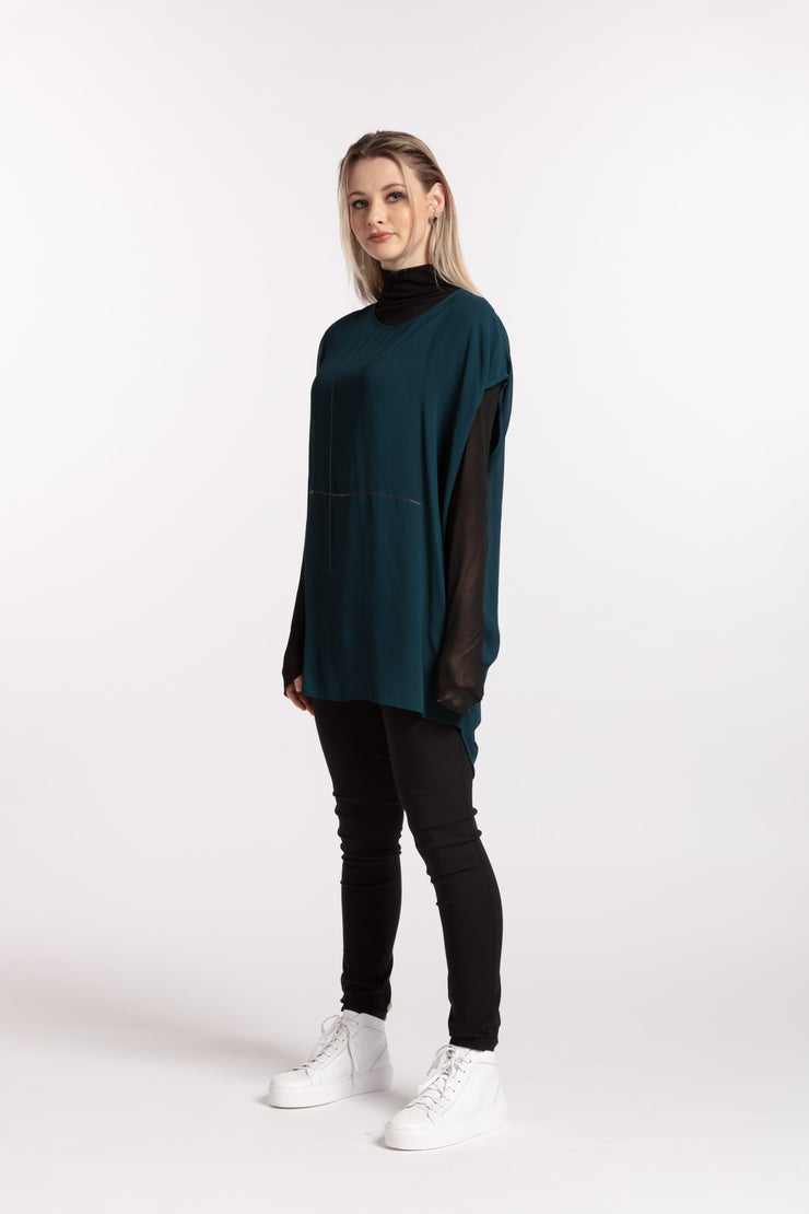 Side view of model wearing Stars Crossed Top Petrol