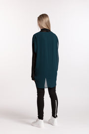 Back view of model wearing Stars Crossed Top Petrol for tall women