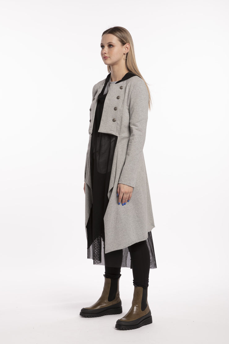 Tall woman wearing X Lab Coat Grey side view