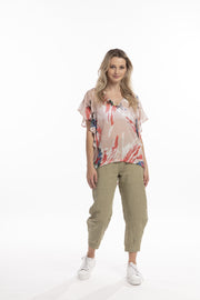 Model wearing Style X Lab Fly Away Top in Red Print. Made longer for tall women