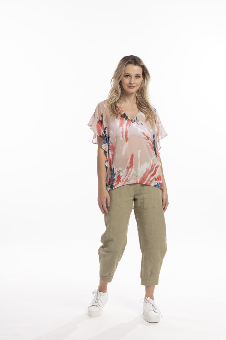 Model wearing Style X Lab Fly Away Top in Red Print. Made longer for tall women