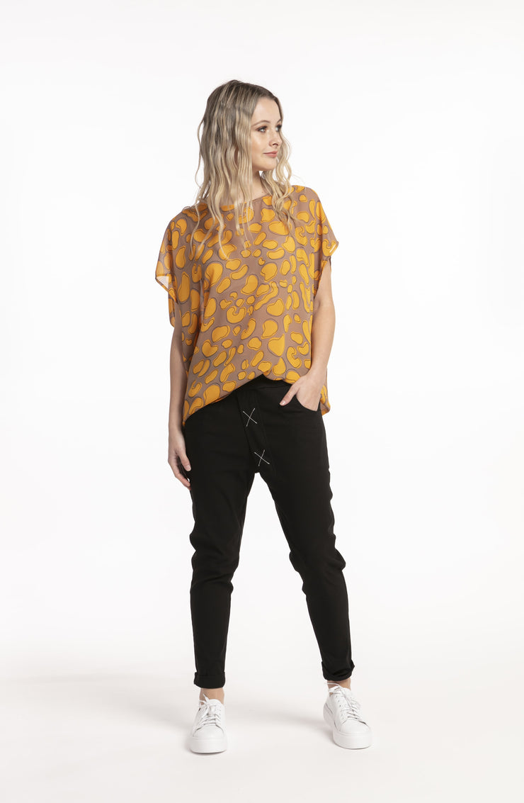 Model wearing XO rare jeans black. For tall women