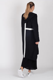 Tall model wearing Linen Coat Black, back