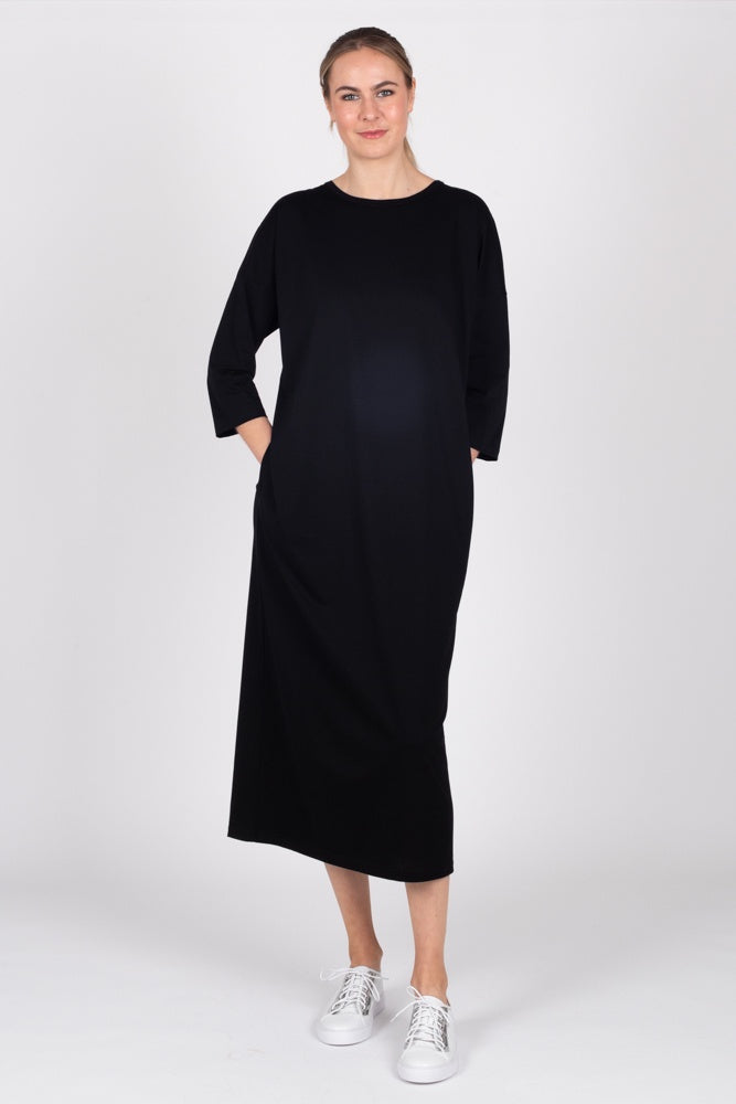 Tall model wearing Lulu Dress Black, front