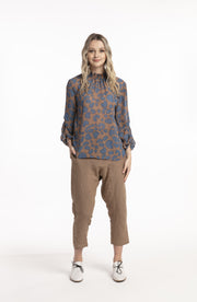 Model wearing Inspiration Top Blue Print
