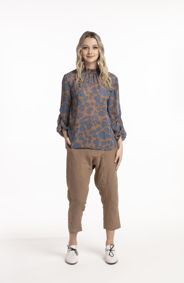 Model wearing Inspiration Top Blue Print