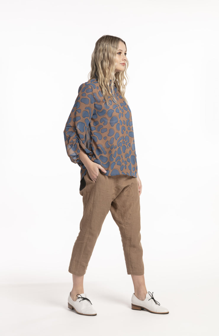 Model wearing Inspiration Top Blue Print side view 2